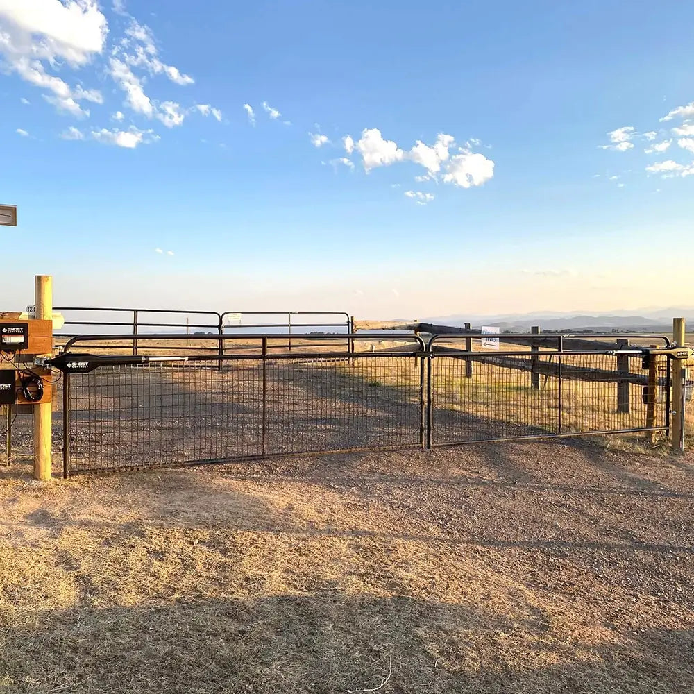 Customer-installed Ghost Controls TDS2XP Solar Gate Opener on Farm Tube Gate